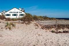 Bass River Light on Lighthouse Inn Building at Beach